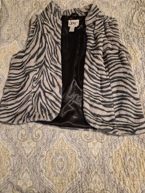 Live a Little Zebra-Print Faux Fur Vest in Gray and Black